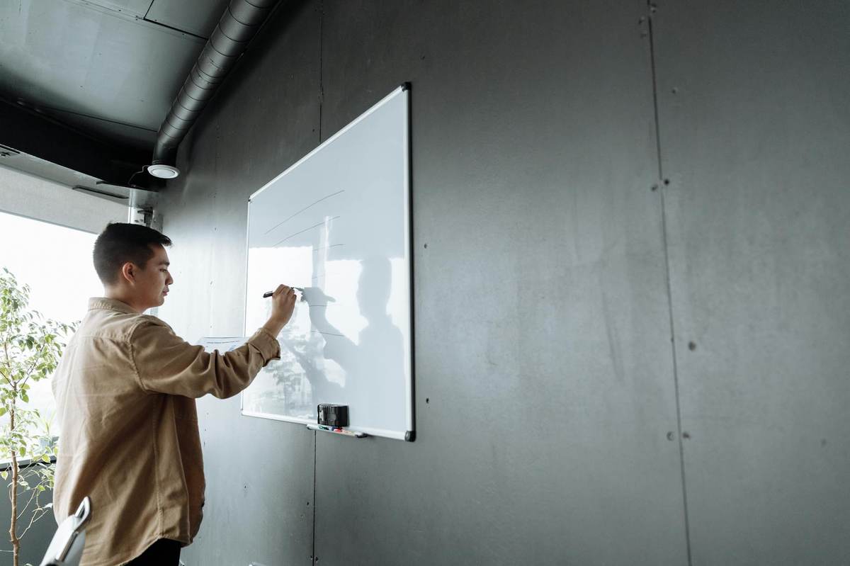 Person brainstorming niche ideas for a paid community