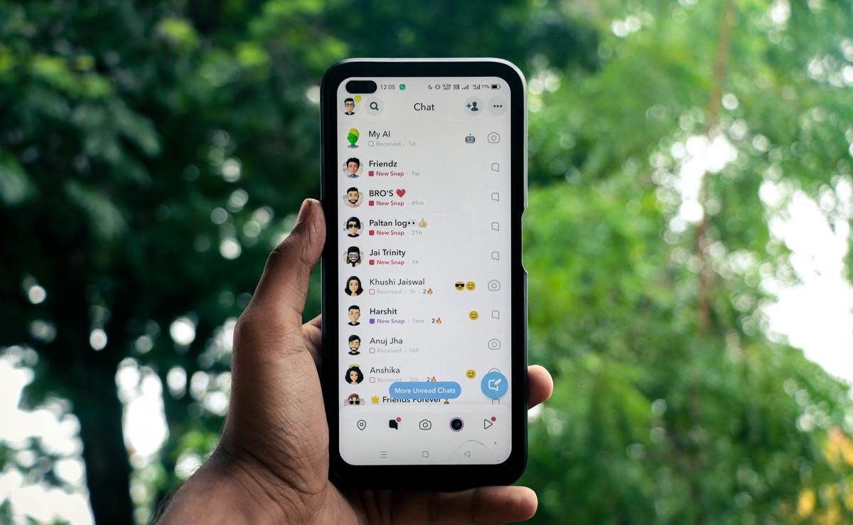 Smartphone showing membership group chat on messaging app