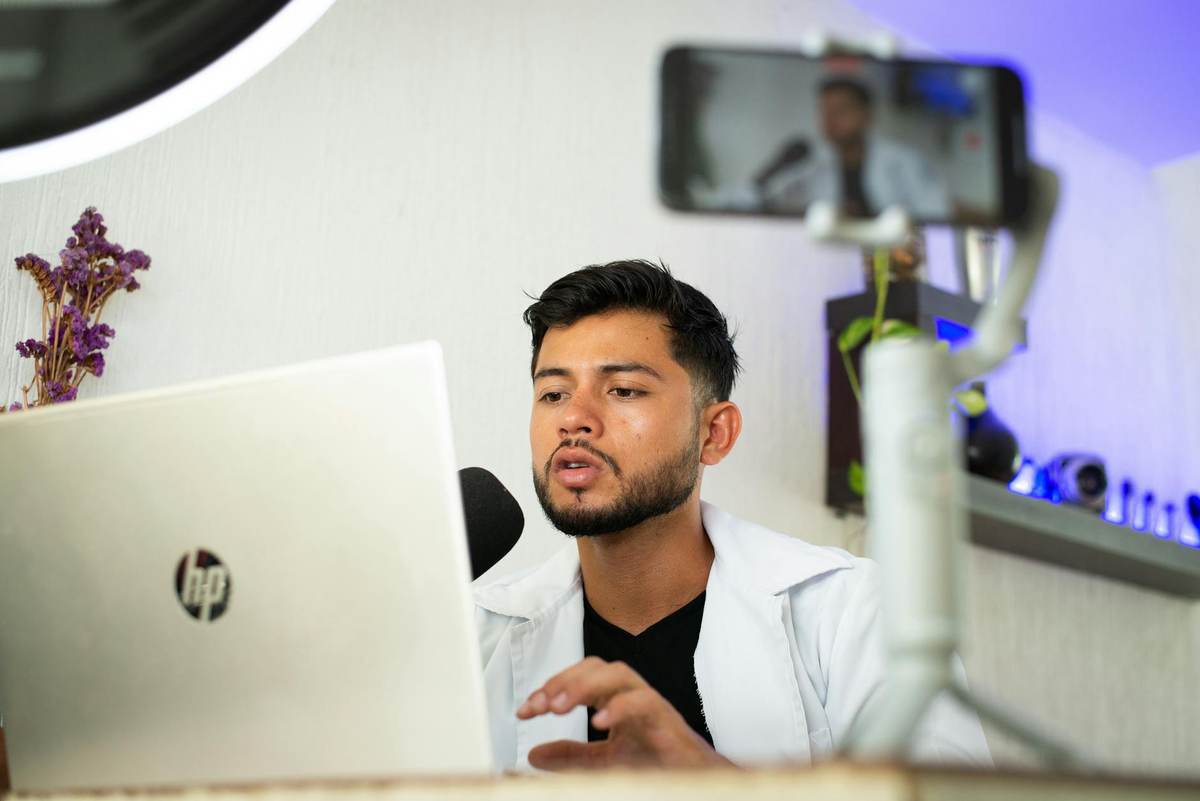 An online coaching creator engaging with their paid community members