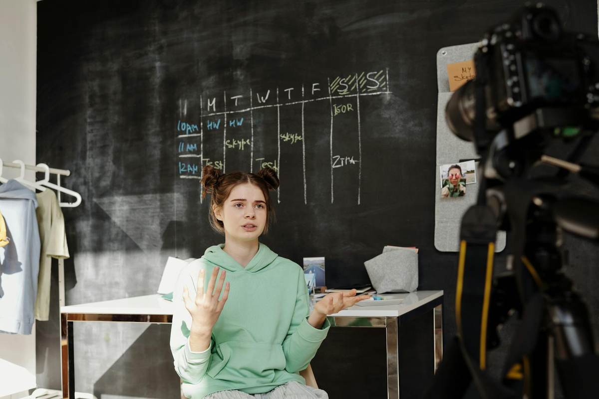 A course creator recording educational content in a home studio environment