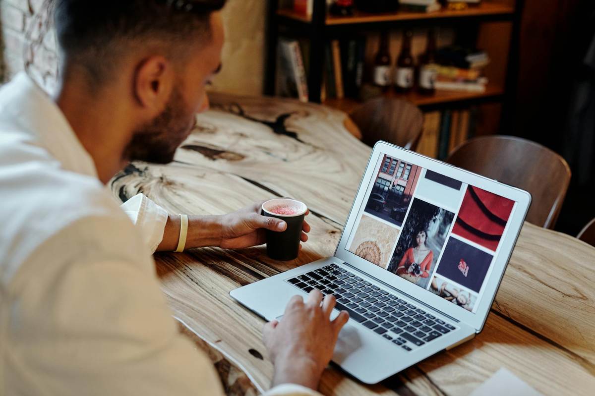 Creator managing telegram channel membership on laptop