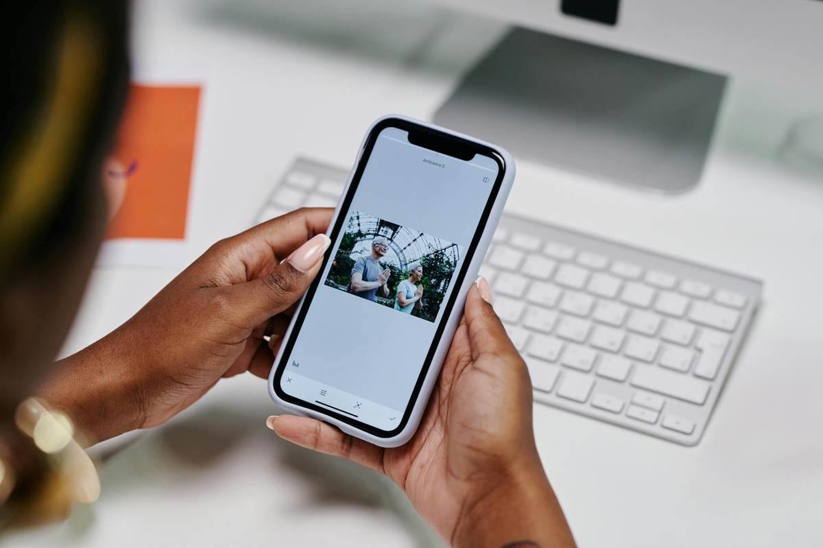 A person setting up their social media channel on a phone