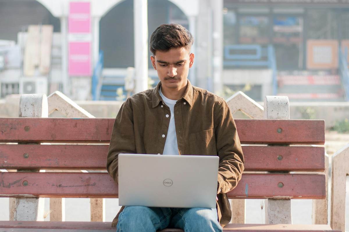 Content creator calculating lifetime membership pricing strategy for a paid Telegram channel