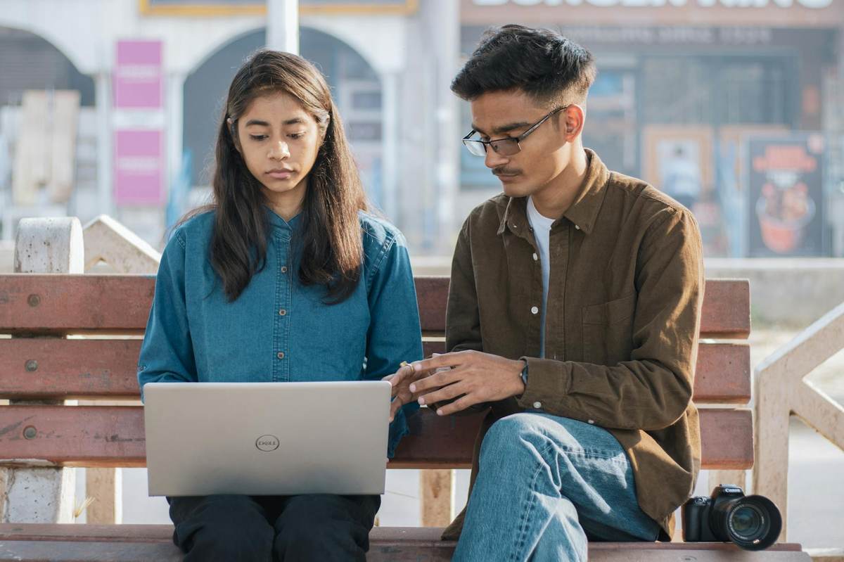 Online community creators engaged in group discussion on digital platforms